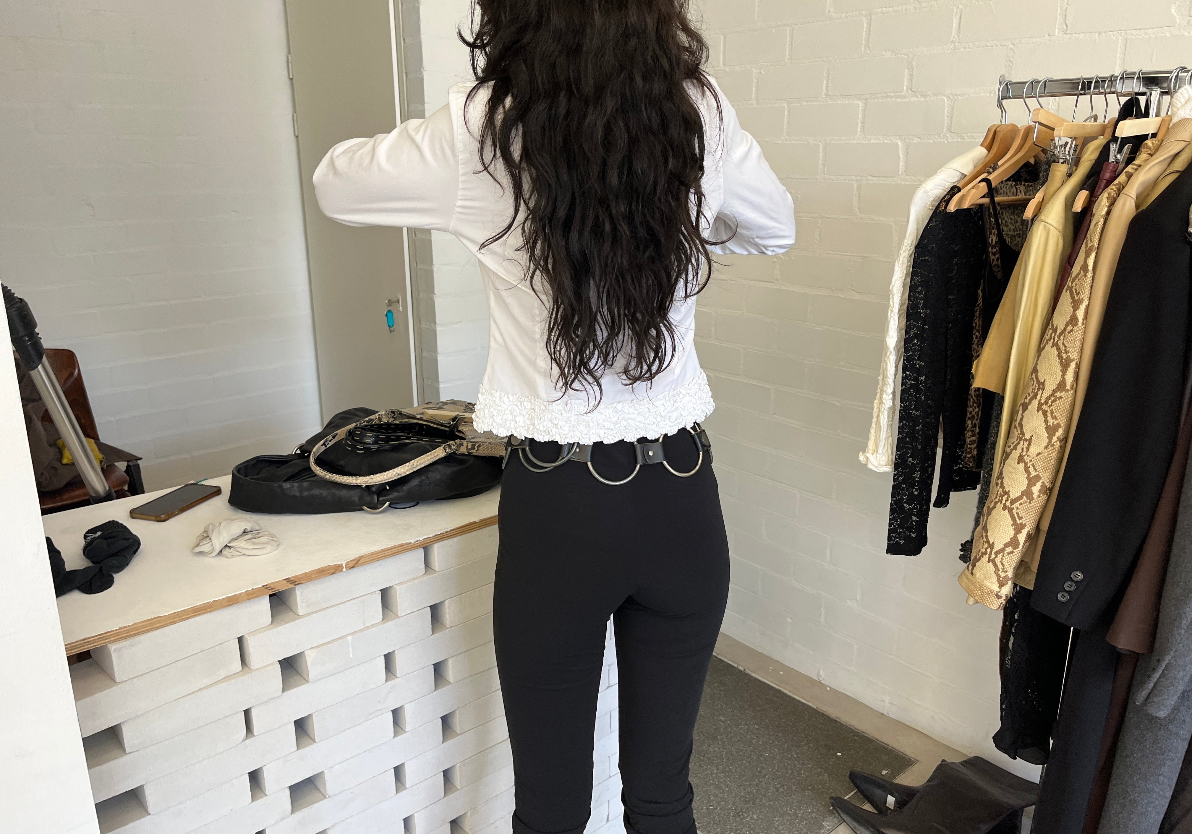 BACKSTAGE DURING EARLY SPRING DROP